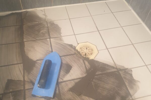 Shower Floor Regrouting By Adam Steam Cleaning.